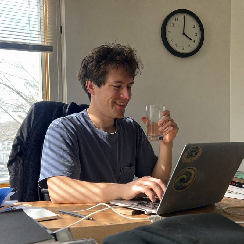 Person working productively at laptop with clean energy
